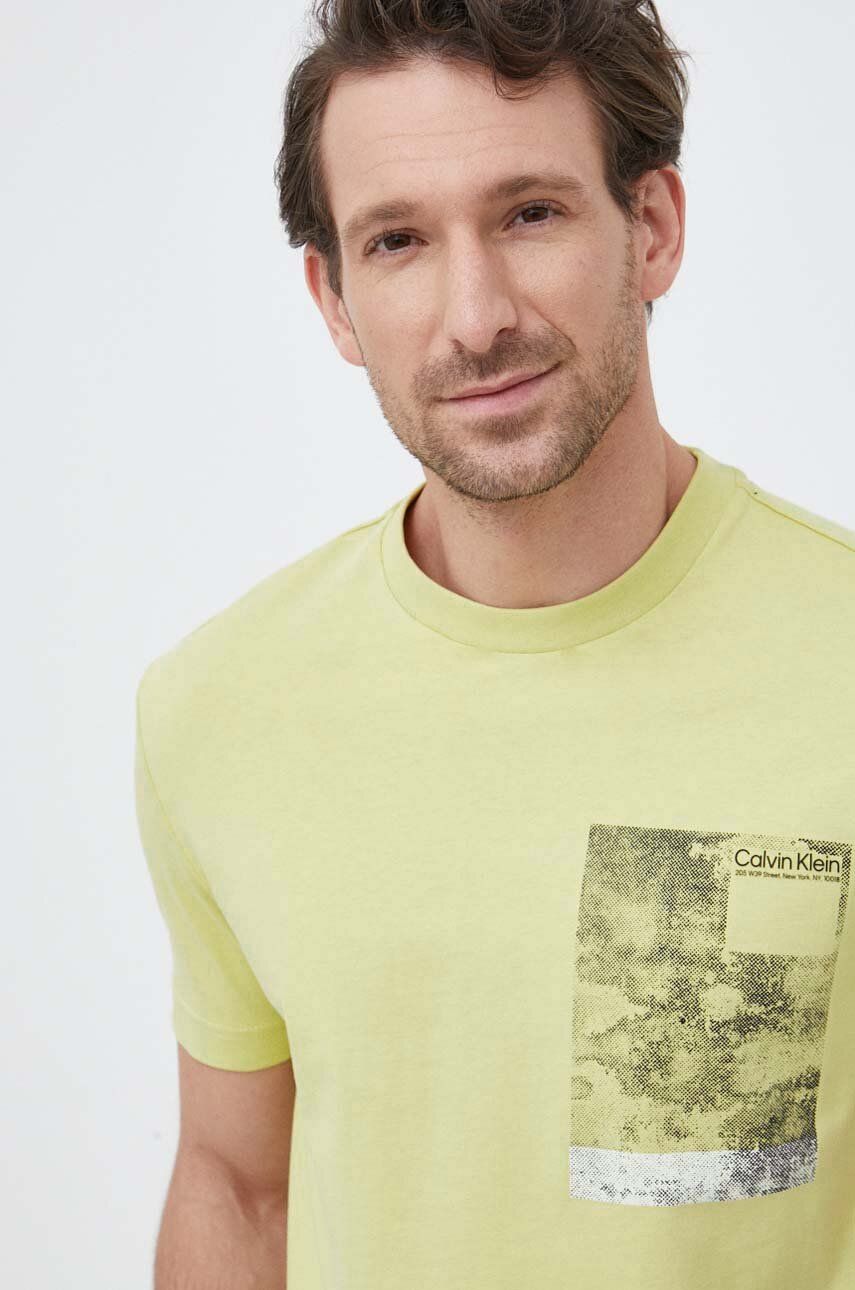 Levně Bavlněné tričko Calvin Klein žlutá barva, s potiskem