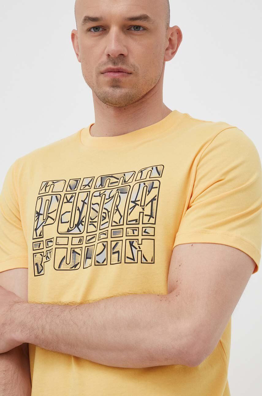 Bavlněné tričko Puma žlutá barva, s potiskem - žlutá -  Hlavní materiál: 100 % Bavlna Stah