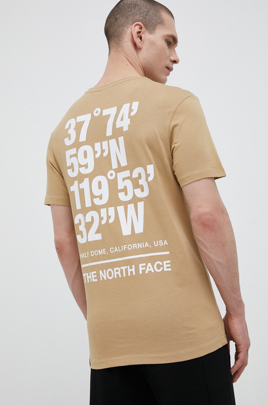 

Бавовняна футболка The North Face колір бежевий з принтом