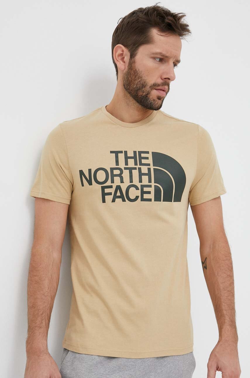 

Бавовняна футболка The North Face колір бежевий з принтом