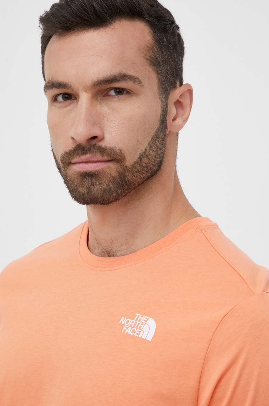 The North Face tricou din bumbac barbati, culoarea portocaliu, cu imprimeu