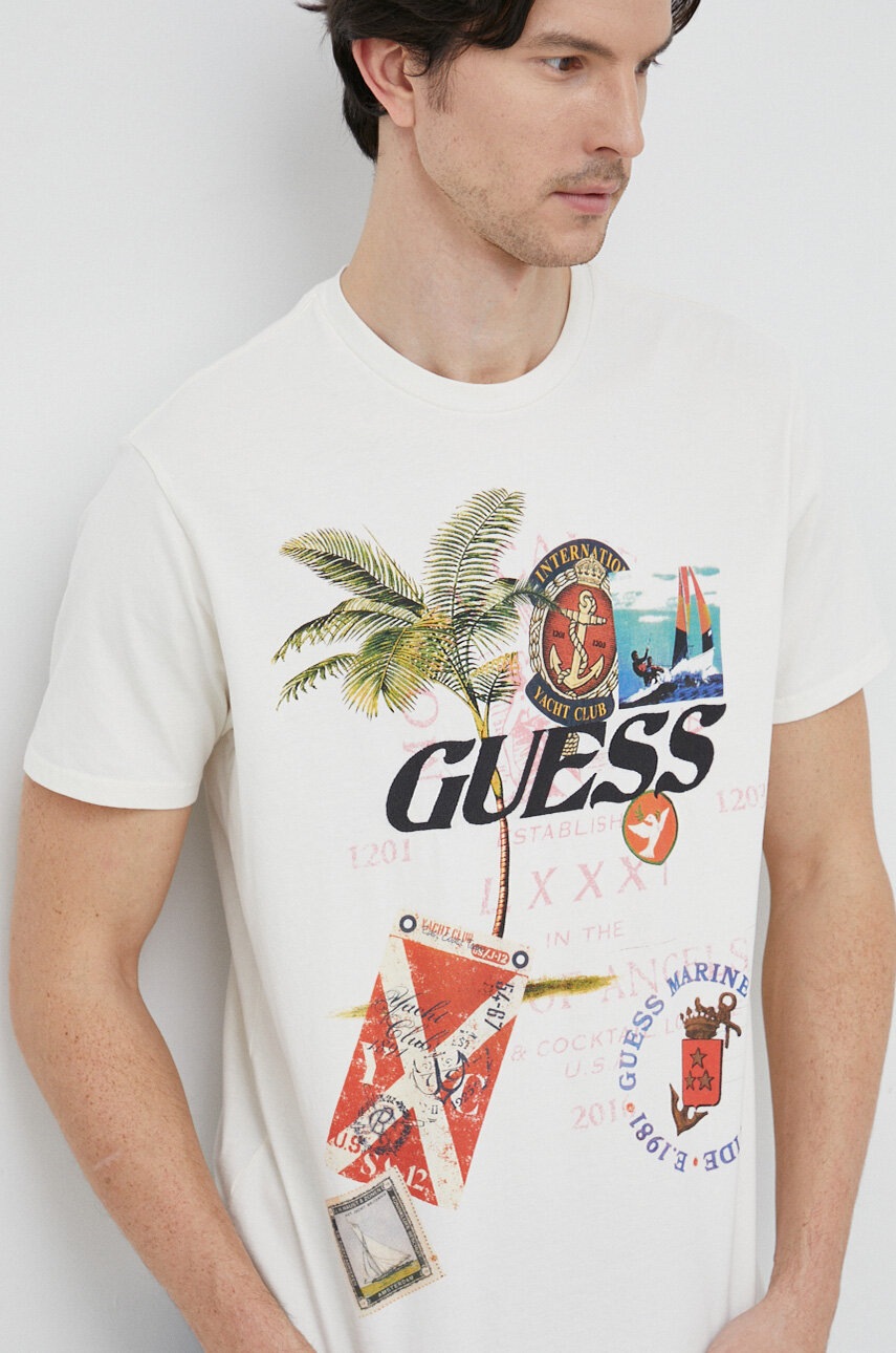 

Хлопковая футболка Guess цвет бежевый с принтом
