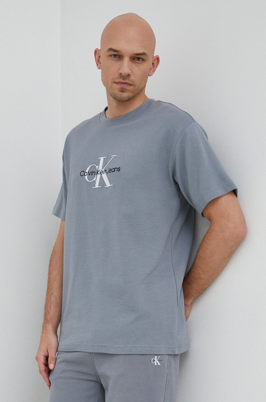 

Тениска Calvin Klein Jeans в синьо с принт, Син