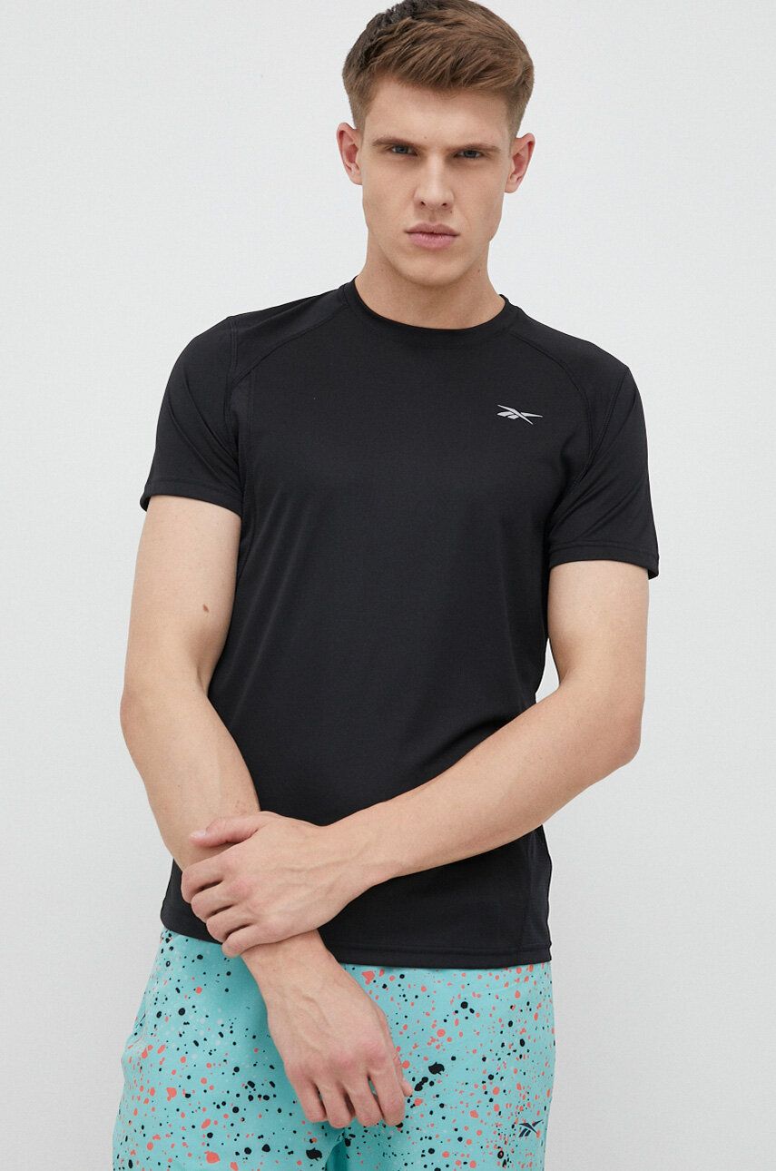 Běžecké tričko Reebok černá barva - černá -  100 % Recyklovaný polyester