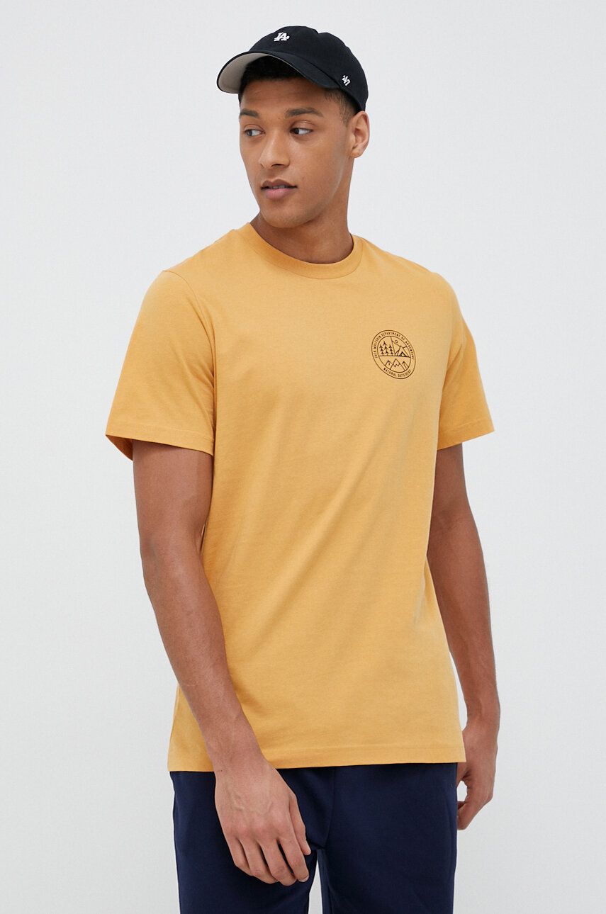 Levně Bavlněné tričko Jack Wolfskin 10 žlutá barva, s potiskem