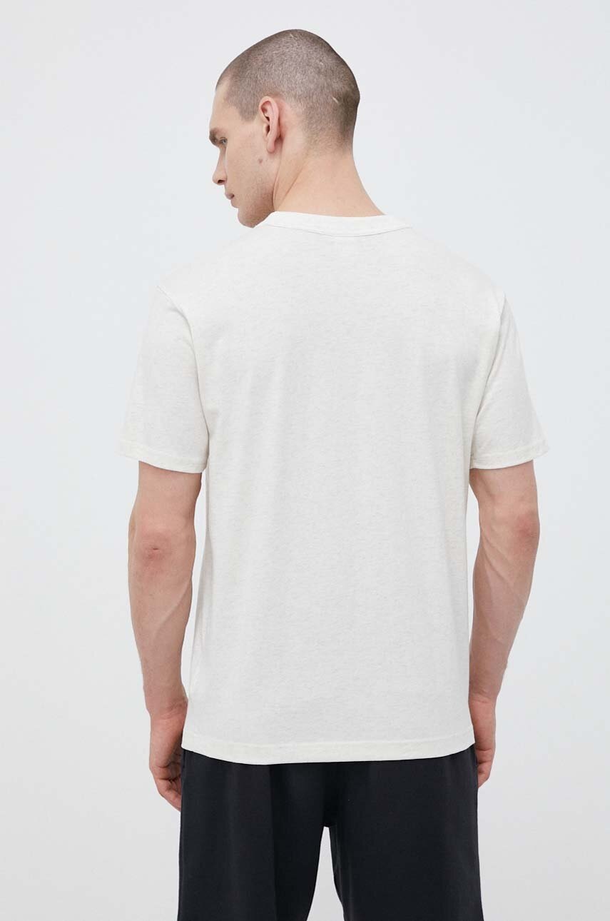 Βαμβακερό μπλουζάκι New Balance χρώμα: μπεζ φωτογραφία