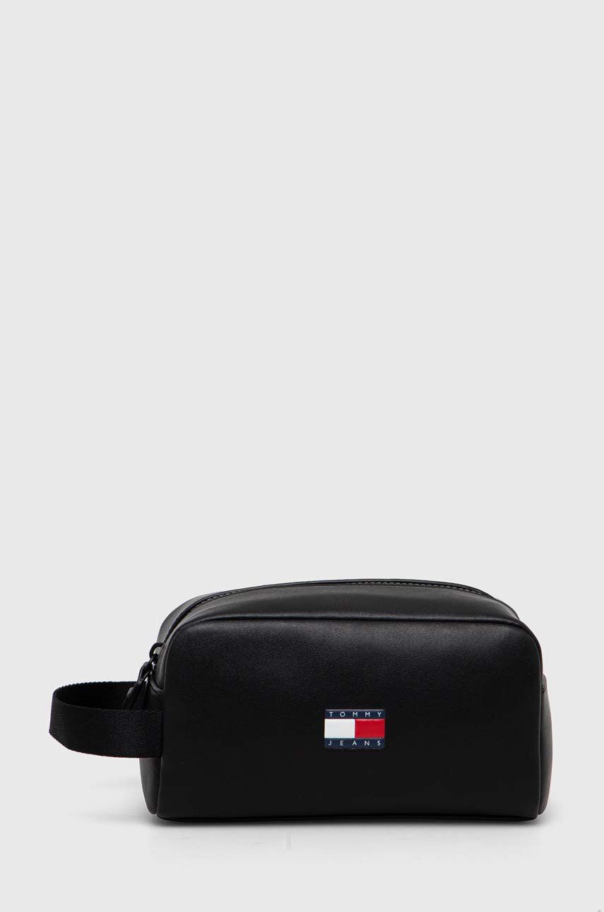 Levně Kožená kosmetická taška Tommy Jeans černá barva