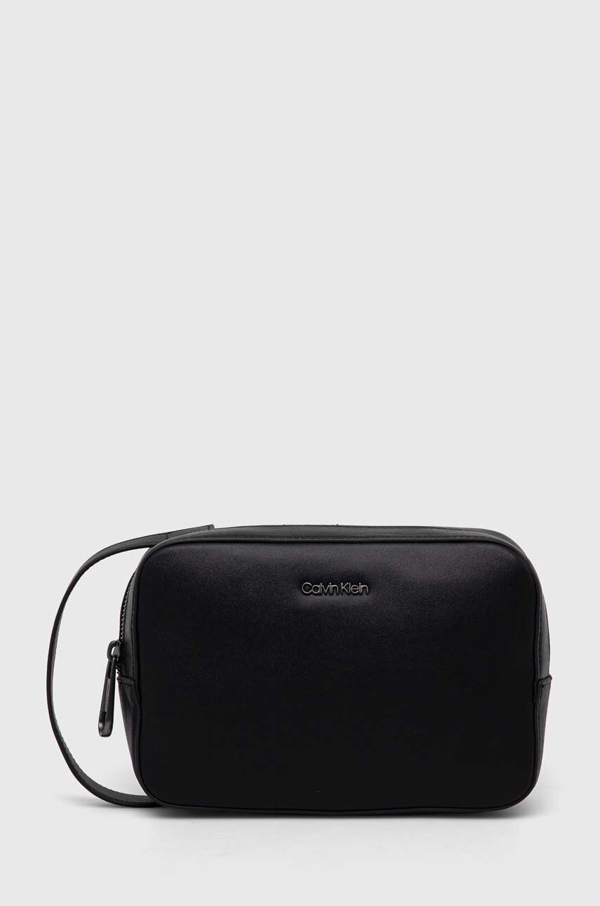 Levně Kosmetická taška Calvin Klein černá barva, K50K511281