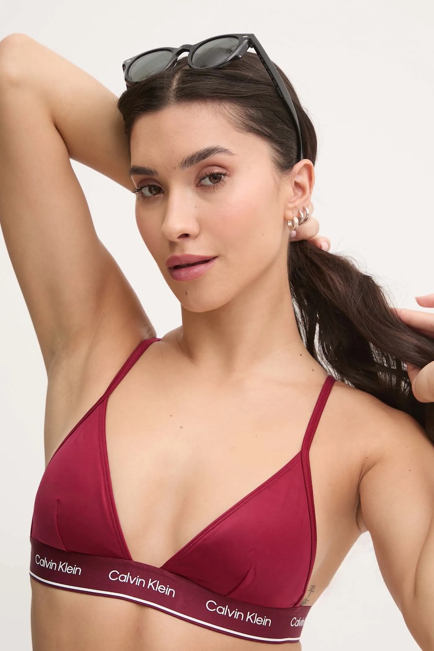 Levně Plavková podprsenka Calvin Klein vínová barva, mírně vyztužený košík