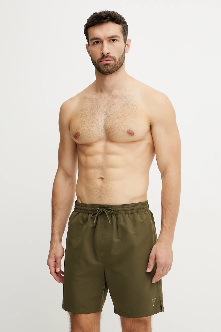 Levně Plavkové šortky Guess zelená barva