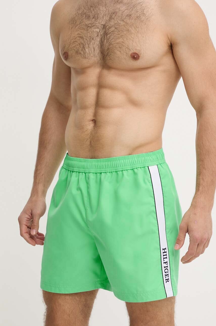 Levně Plavkové šortky Tommy Hilfiger zelená barva, UM0UM03213