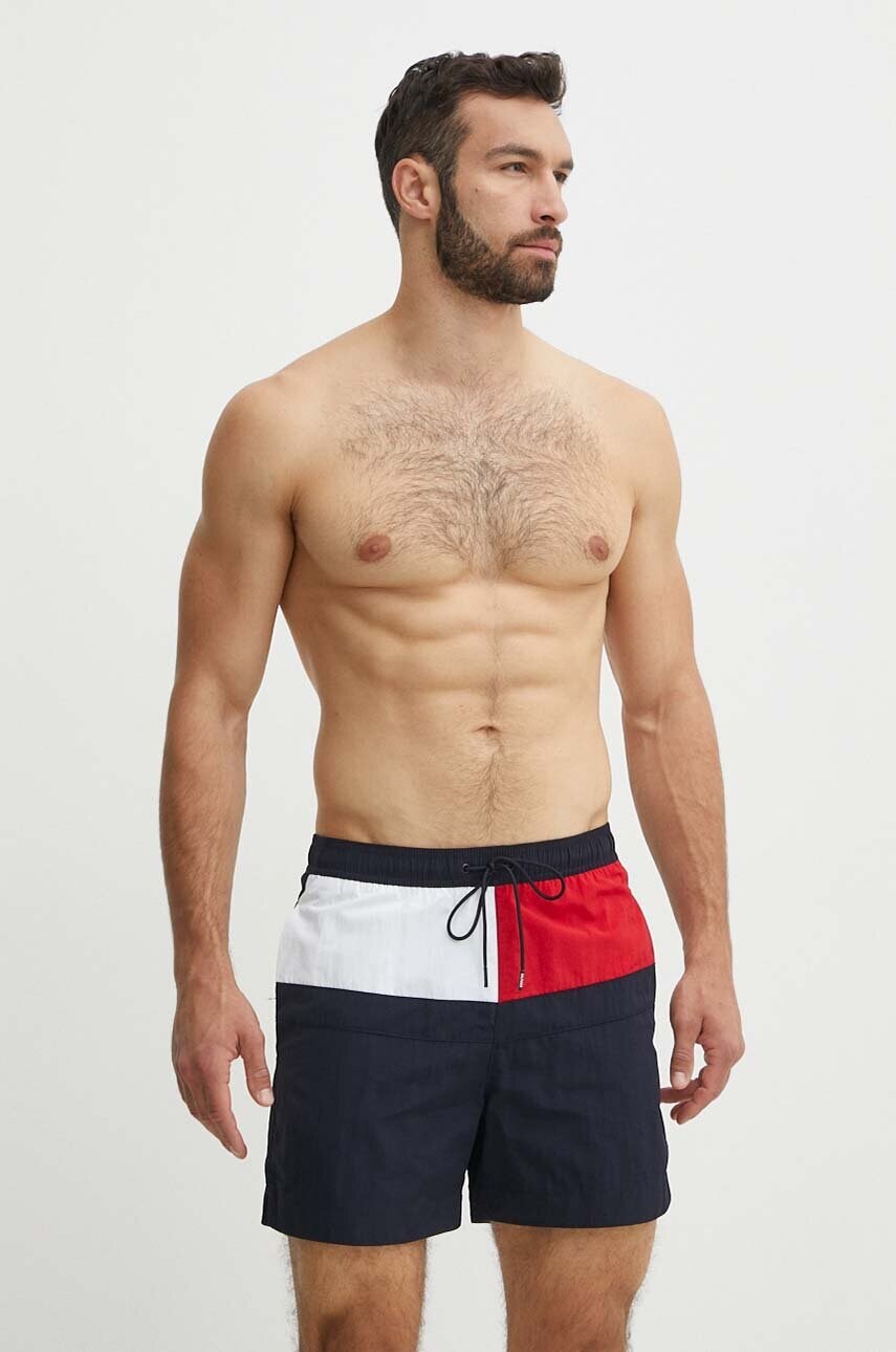 Levně Plavkové šortky Tommy Hilfiger tmavomodrá barva, UM0UM03259