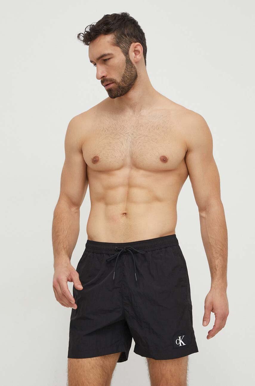 

Плувни шорти Calvin Klein в черно KM0KM00980, Черен