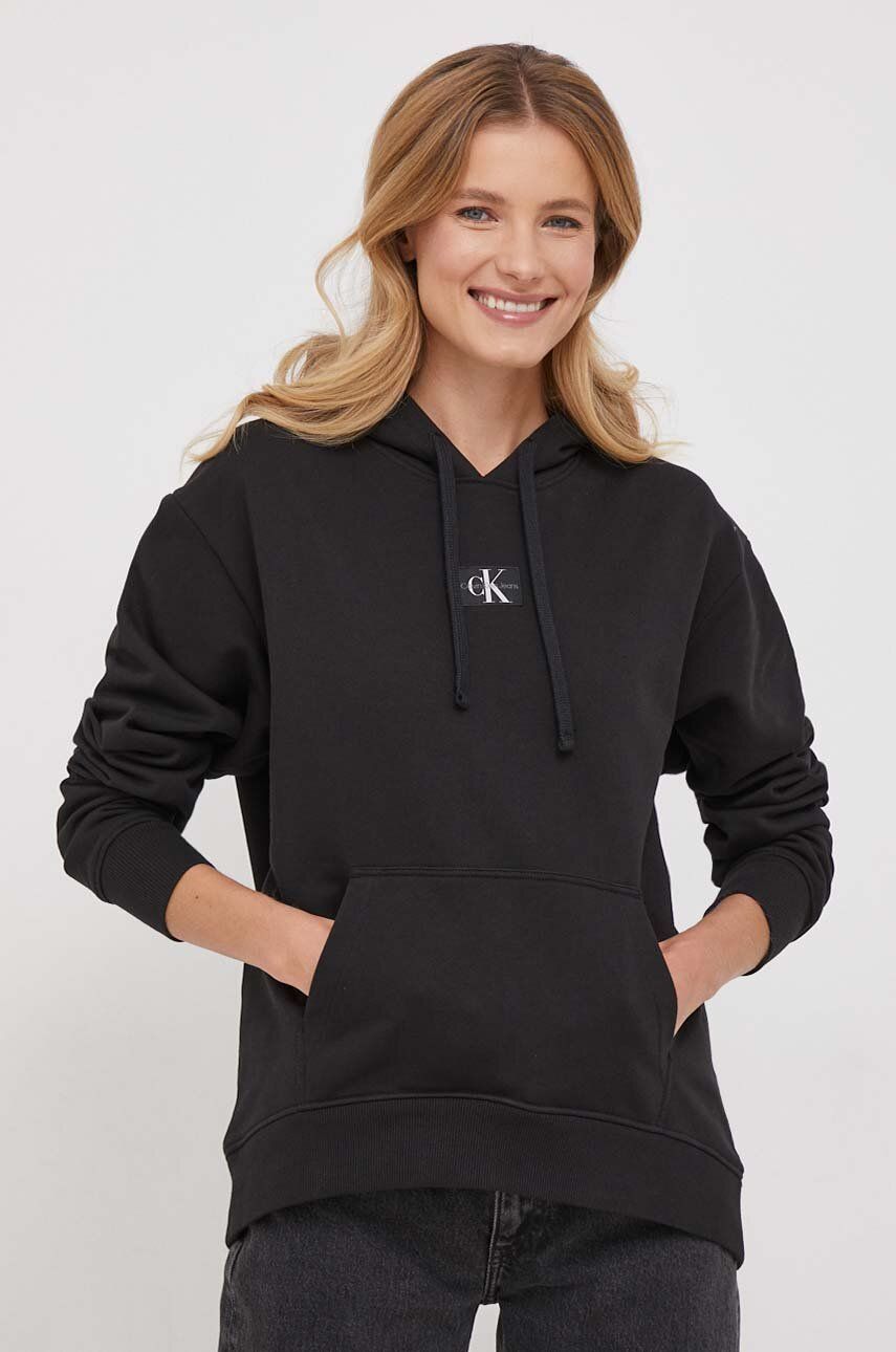 E-shop Bavlněná mikina Calvin Klein Jeans dámská, černá barva, s kapucí, s aplikací