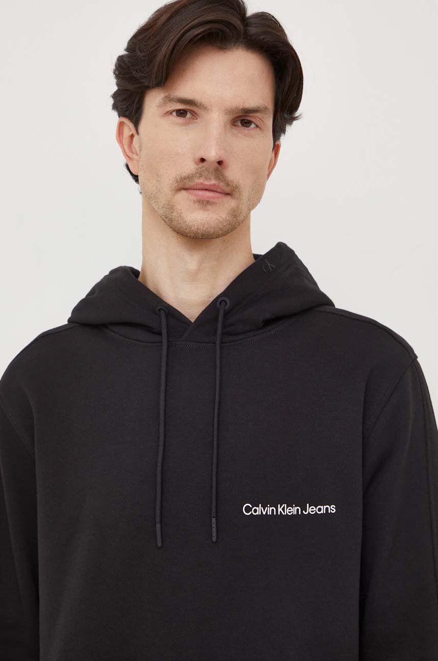 Levně Bavlněná mikina Calvin Klein Jeans pánská, černá barva, s kapucí, hladká, J30J324620