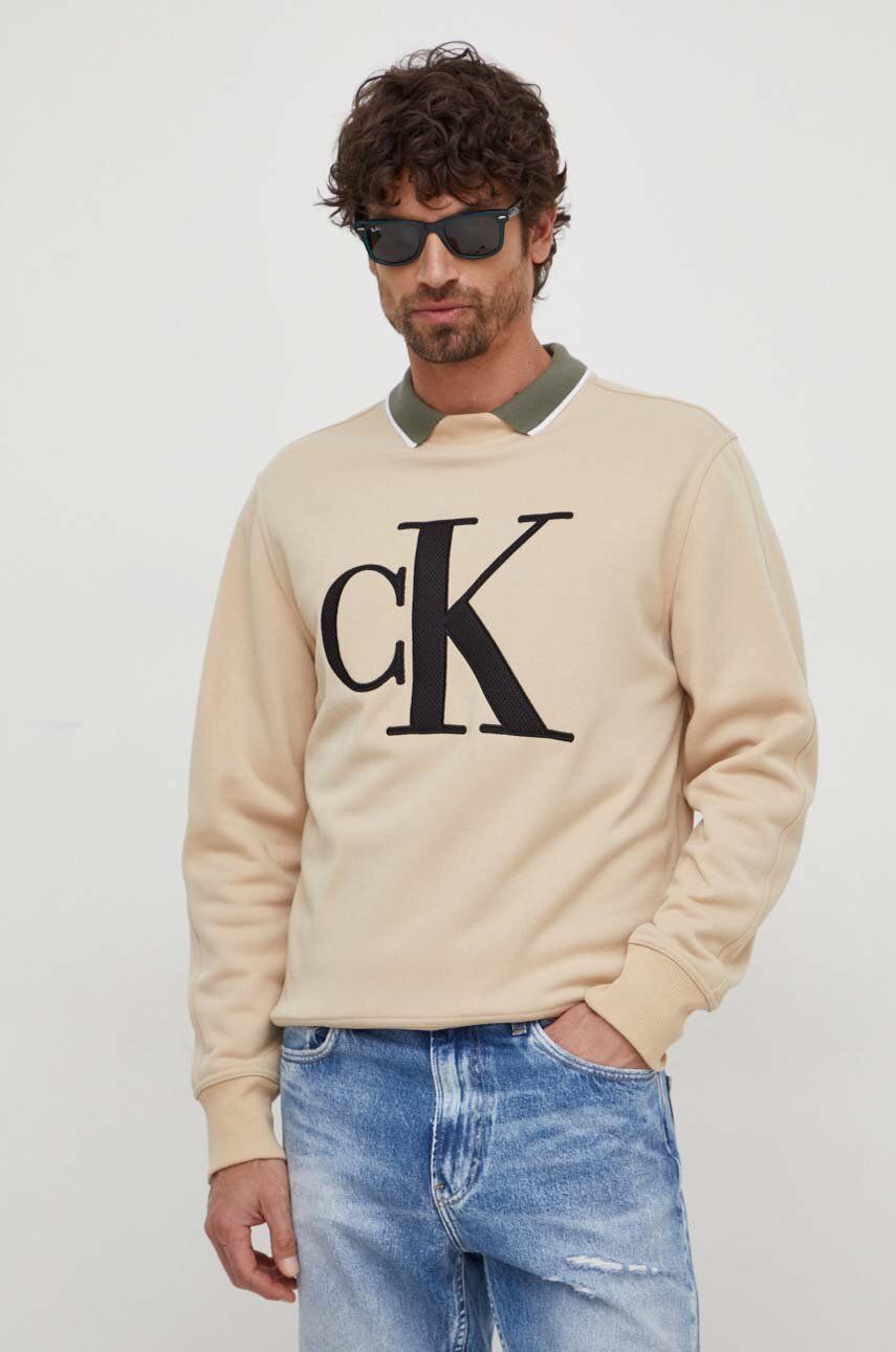 Levně Mikina Calvin Klein Jeans pánská, béžová barva, s aplikací