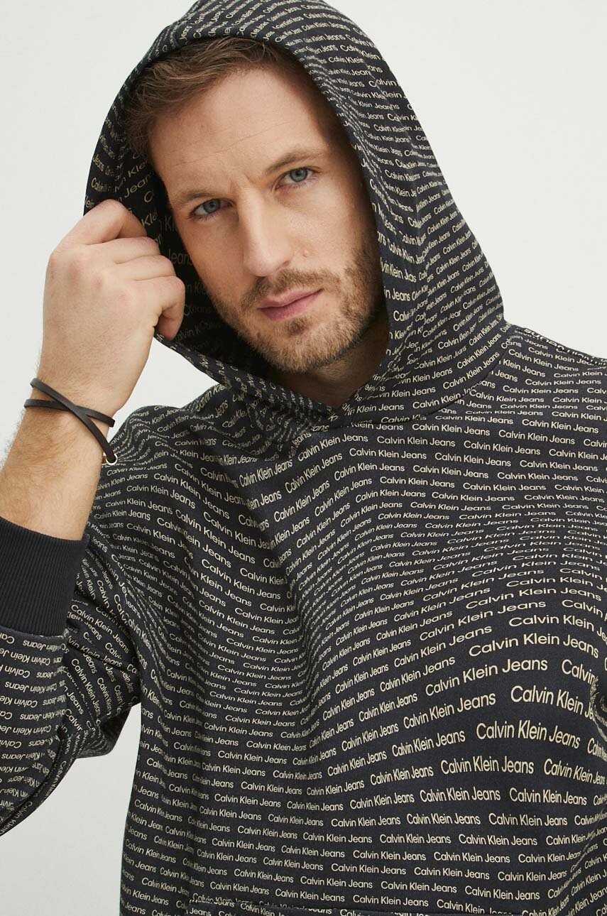 Бавовняна кофта Calvin Klein Jeans чоловіча колір чорний з капюшоном візерунок J30J325350 