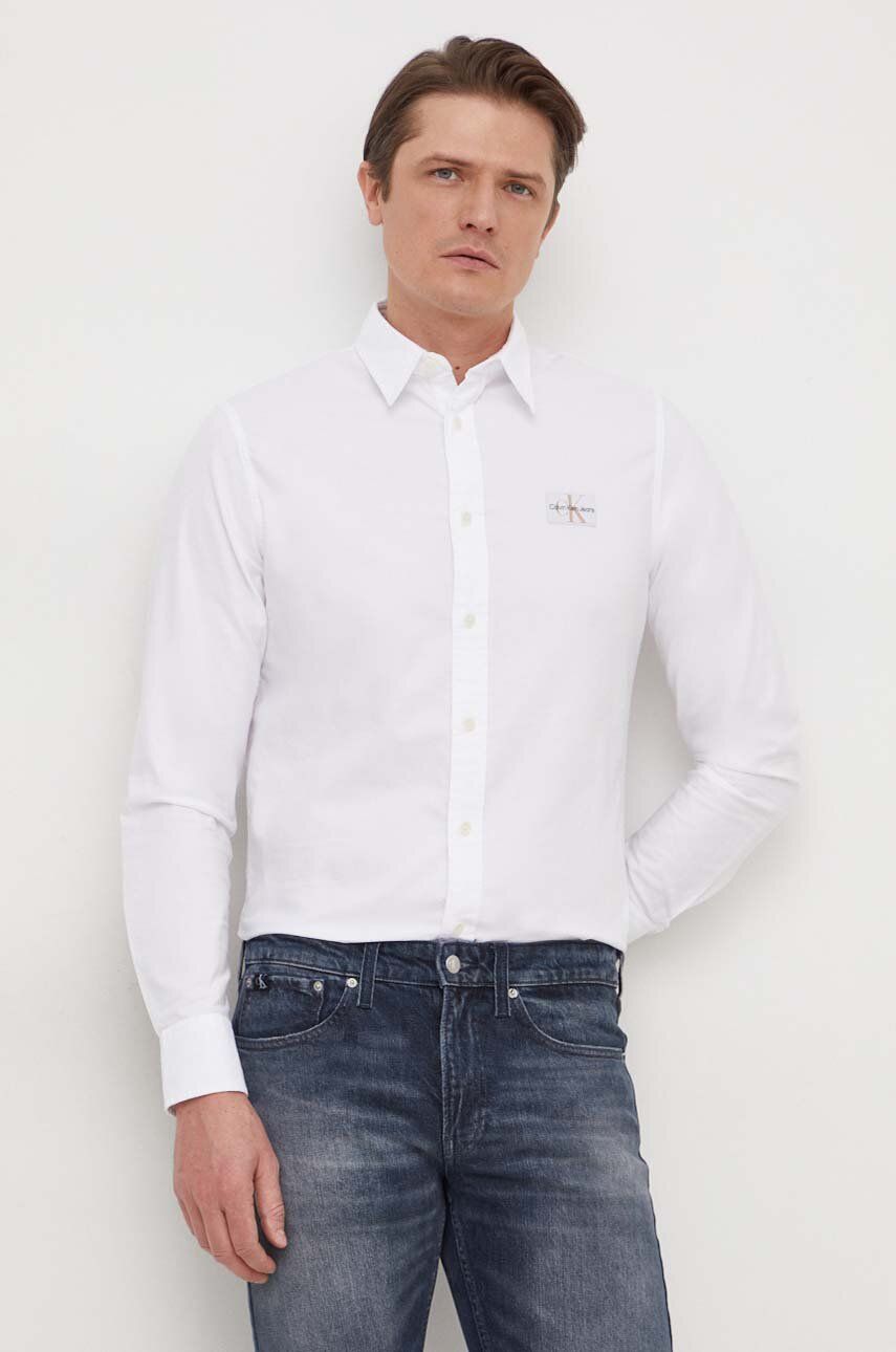 Levně Košile Calvin Klein Jeans bílá barva, regular, s klasickým límcem
