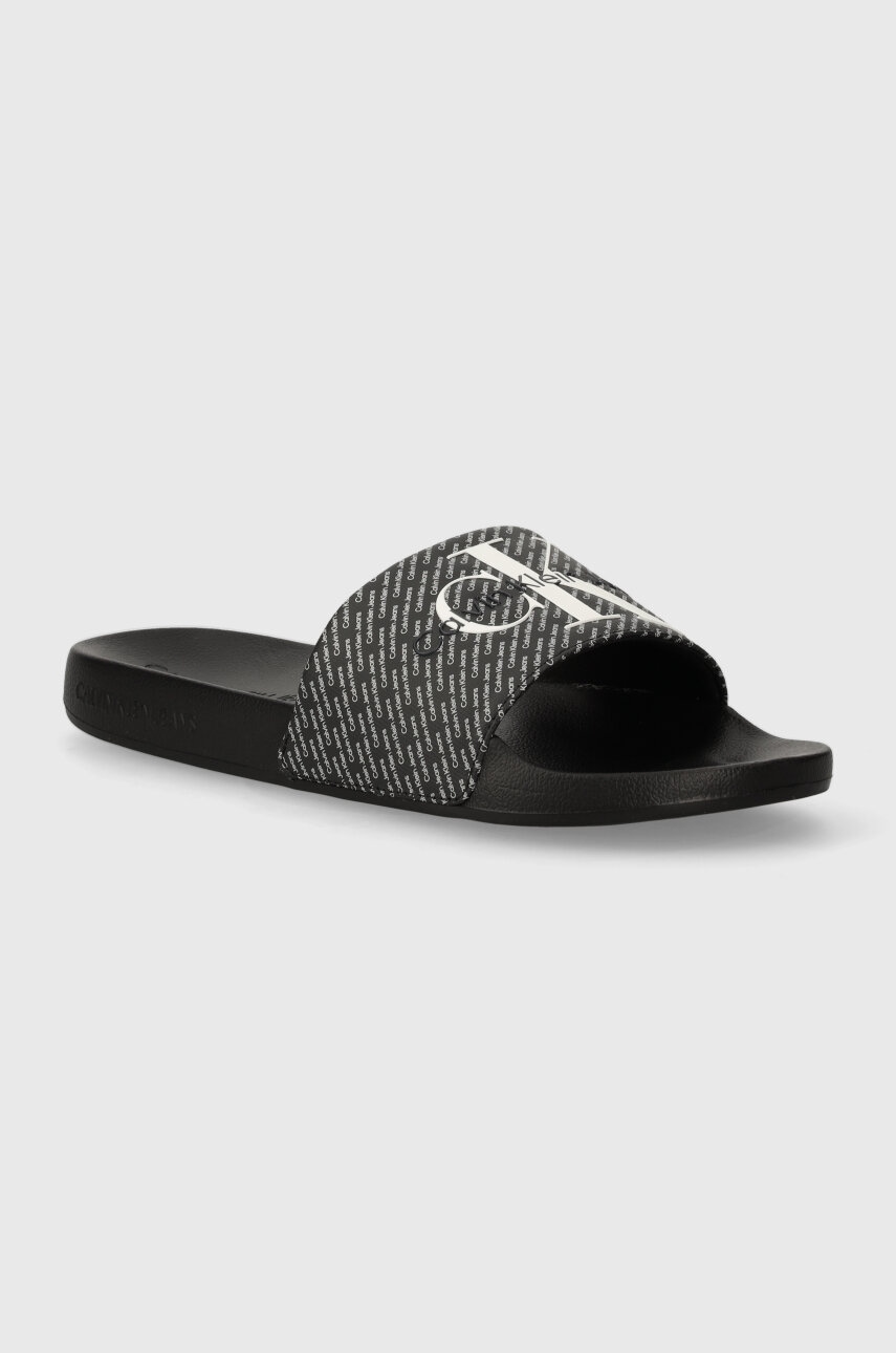 Levně Pantofle Calvin Klein Jeans SLIDE AOP pánské, černá barva, YM0YM00955