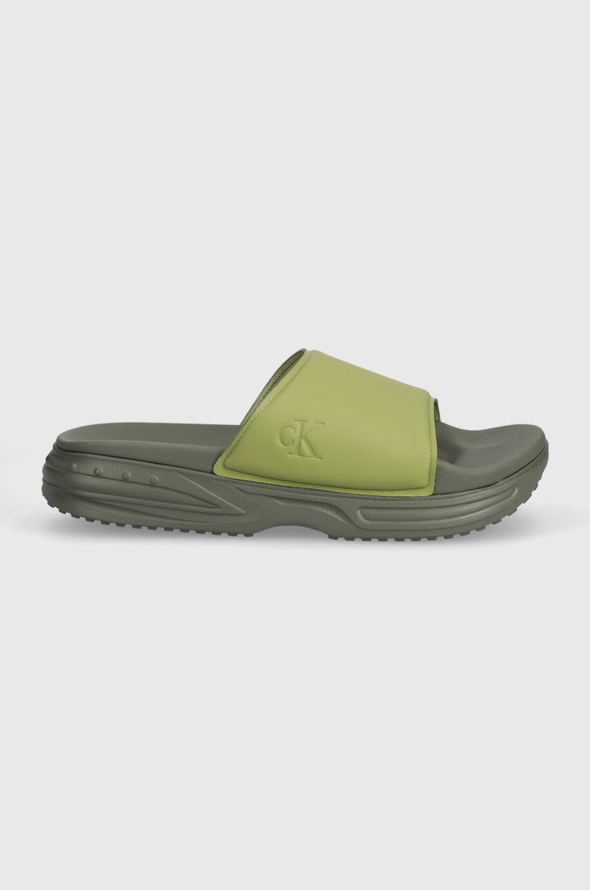 Levně Pantofle Calvin Klein Jeans CHUNKY COMF SLIDE MINIMAL RAW pánské, zelená barva, YM0YM00956