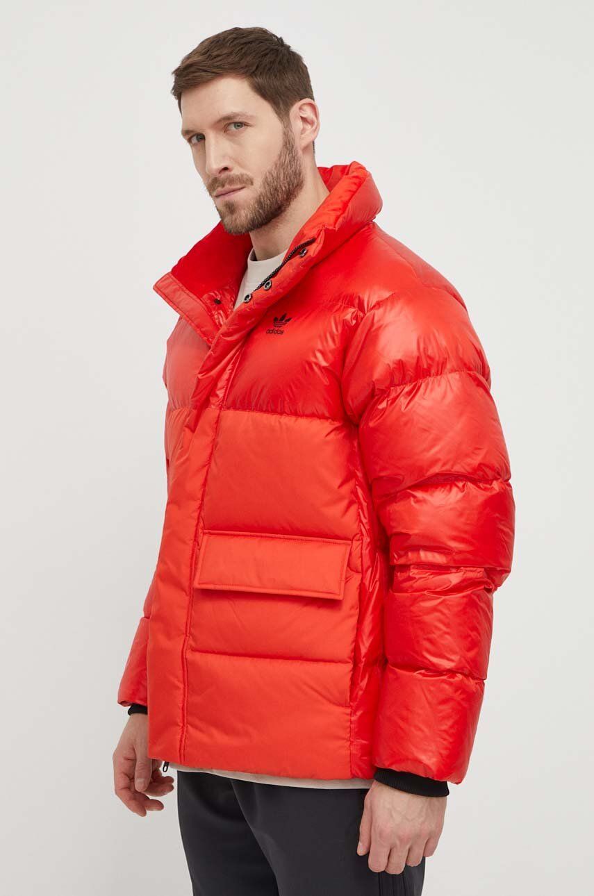 Levně Péřová bunda adidas Originals pánská, červená barva, zimní, IR7132