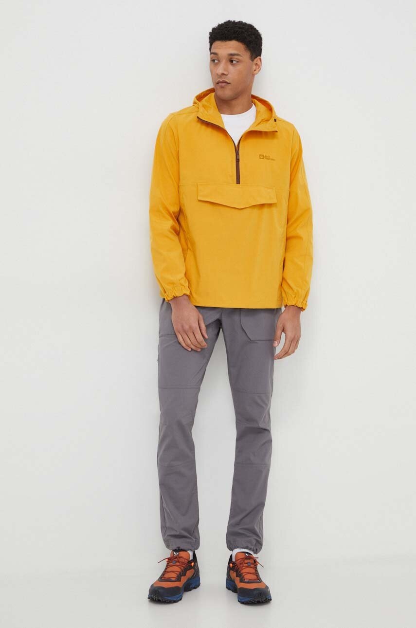 Αδιάβροχο μπουφάν Jack Wolfskin Desert Wind Overhead ανδρικό, χρώμα: κίτρινο φωτογραφία