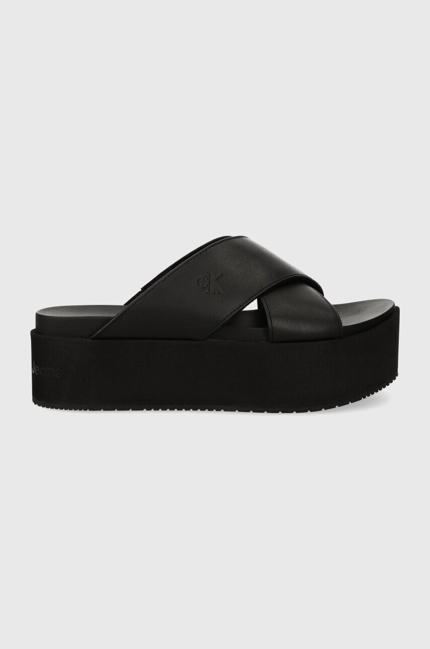 Levně Kožené pantofle Calvin Klein Jeans FLATFORM CROSS MG UC dámské, černá barva, na platformě, YW0YW01349