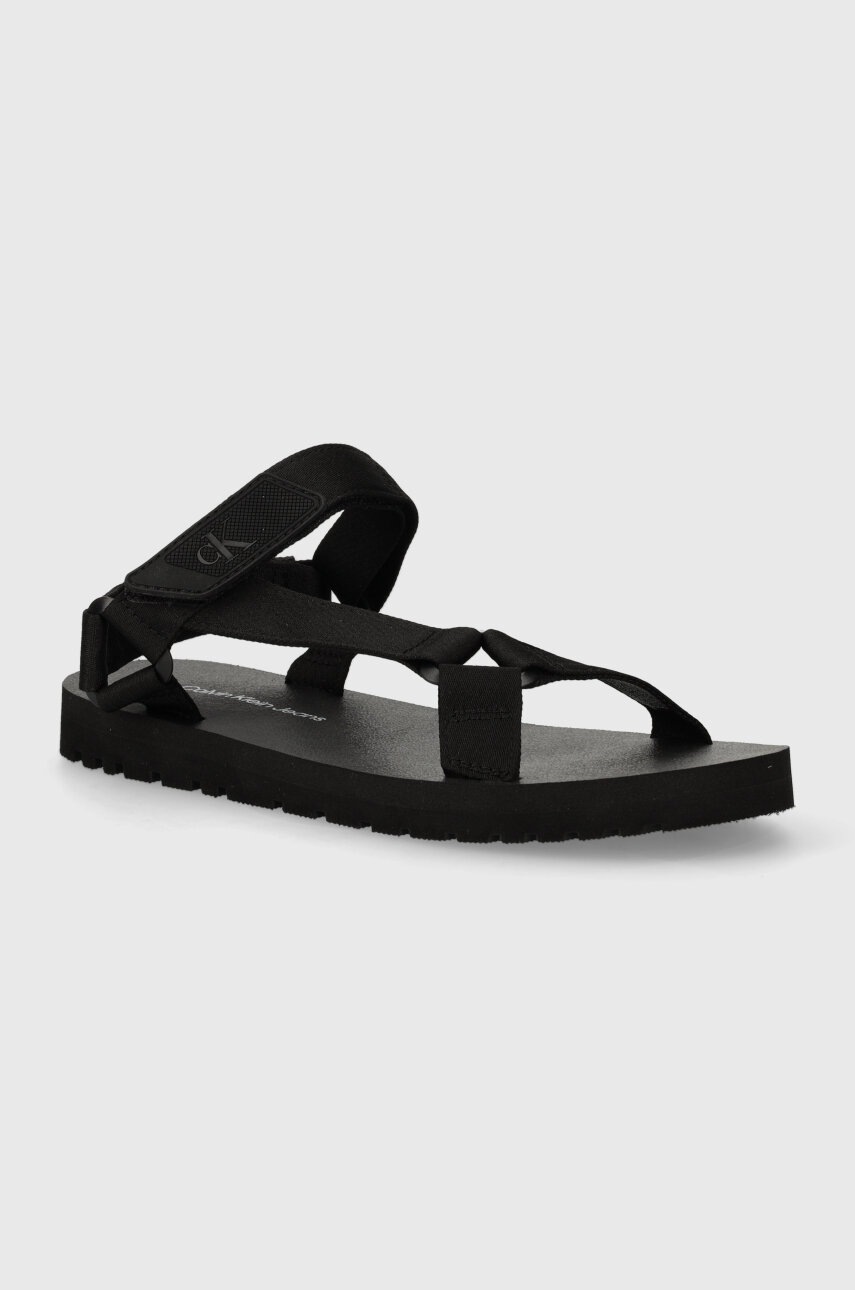 Levně Sandály Calvin Klein Jeans SANDAL VELCRO RP IN BTW pánské, černá barva, YM0YM00944