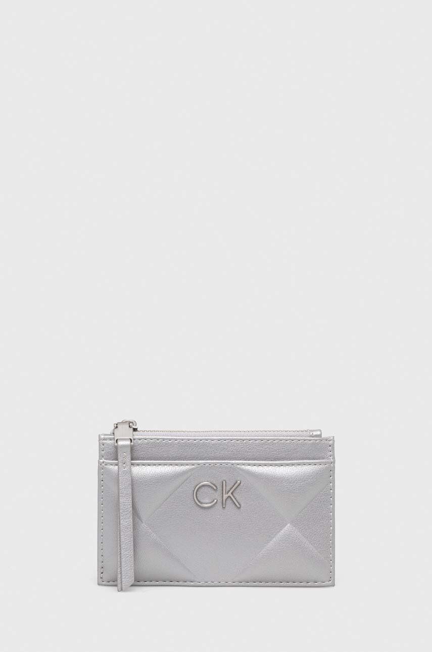 Peněženka Calvin Klein stříbrná barva