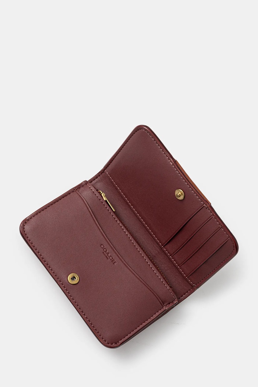 Шкіряний гаманець Coach жіночий колір коричневий 
