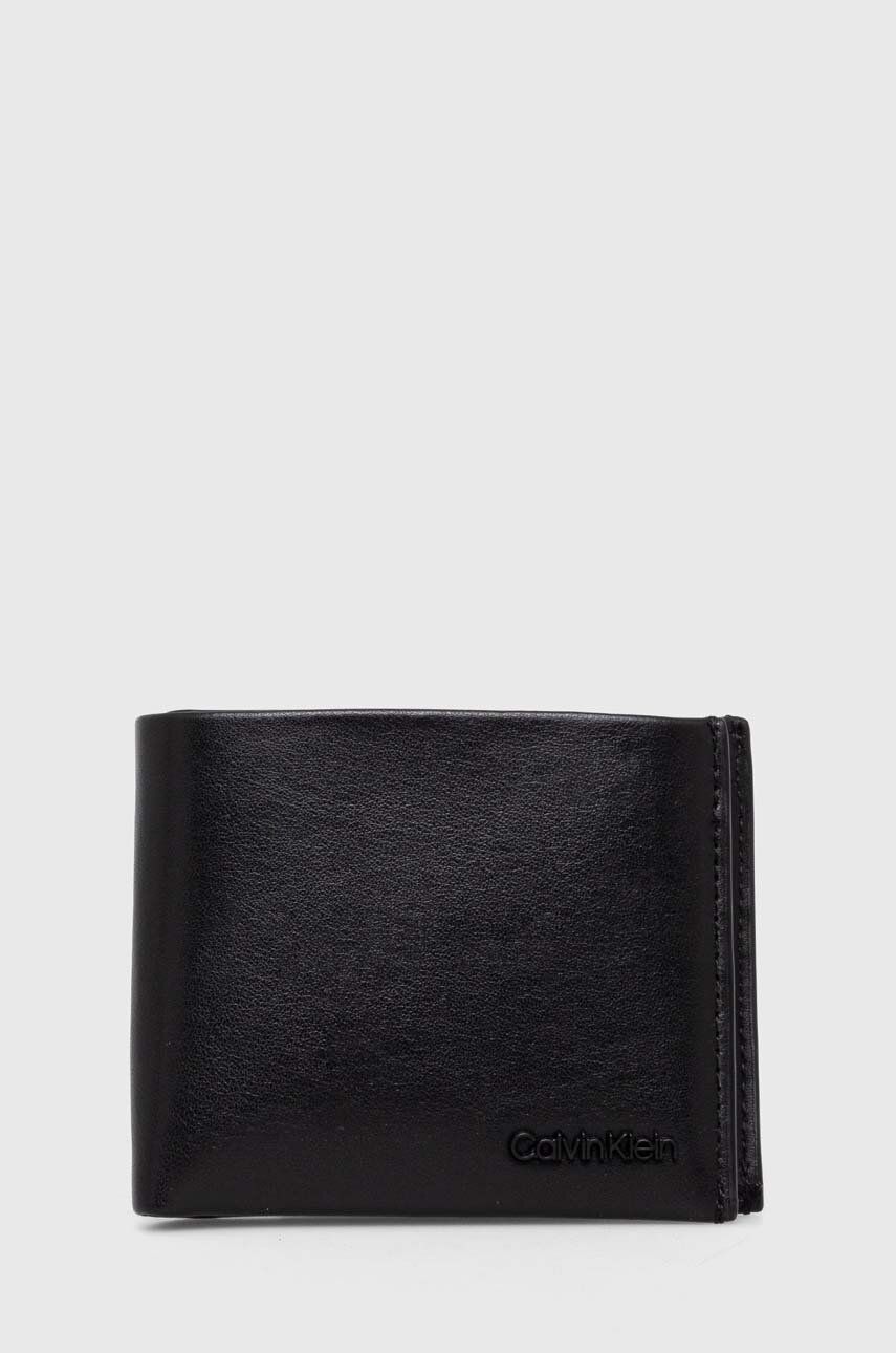 Levně Kožená peněženka Calvin Klein černá barva, K50K511276