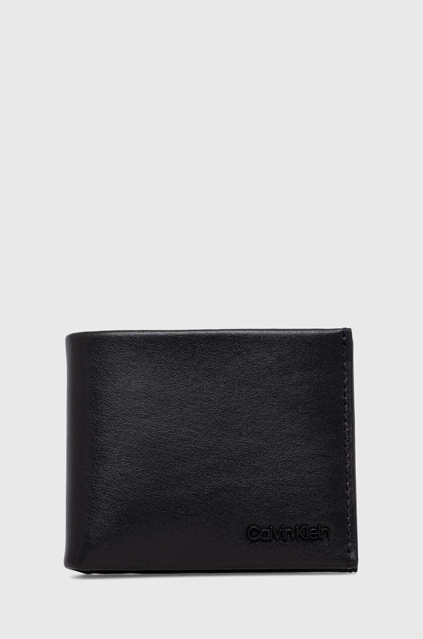 Levně Kožená peněženka Calvin Klein černá barva, K50K511277