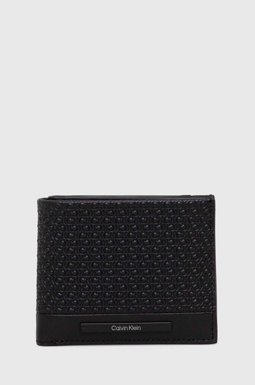 Levně Kožená peněženka Calvin Klein černá barva, K50K511378