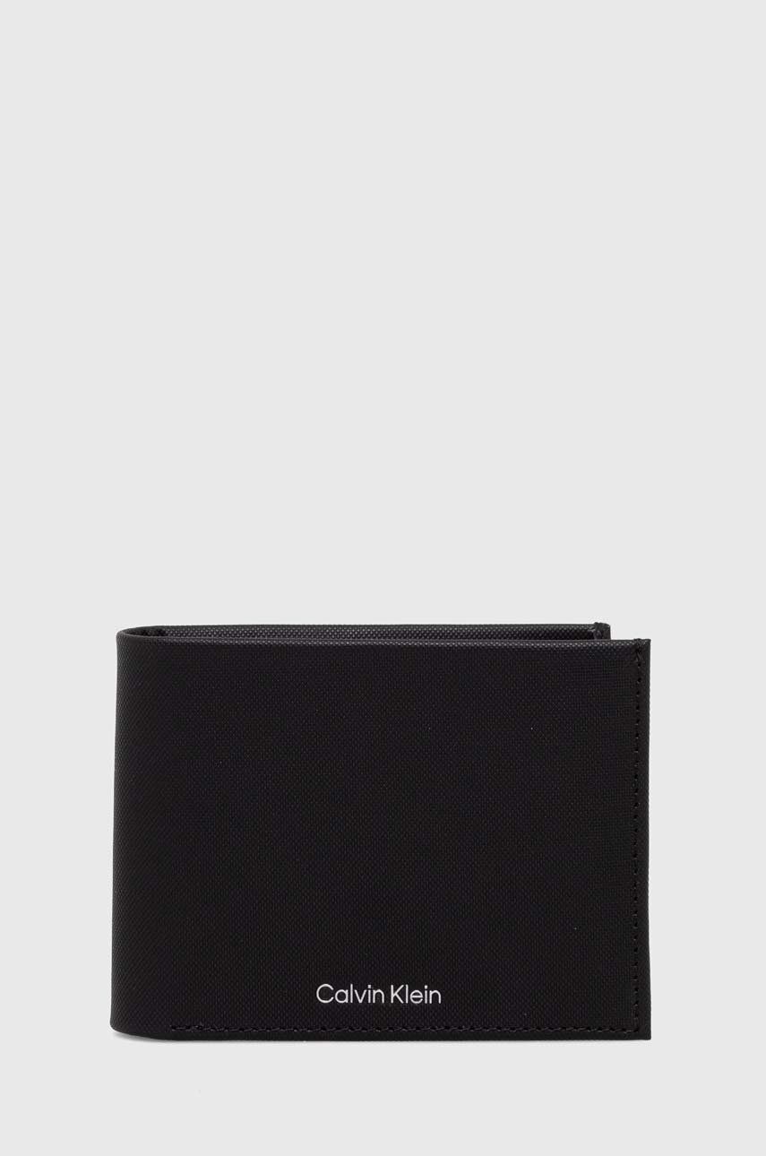Levně Kožená peněženka Calvin Klein černá barva, K50K511380
