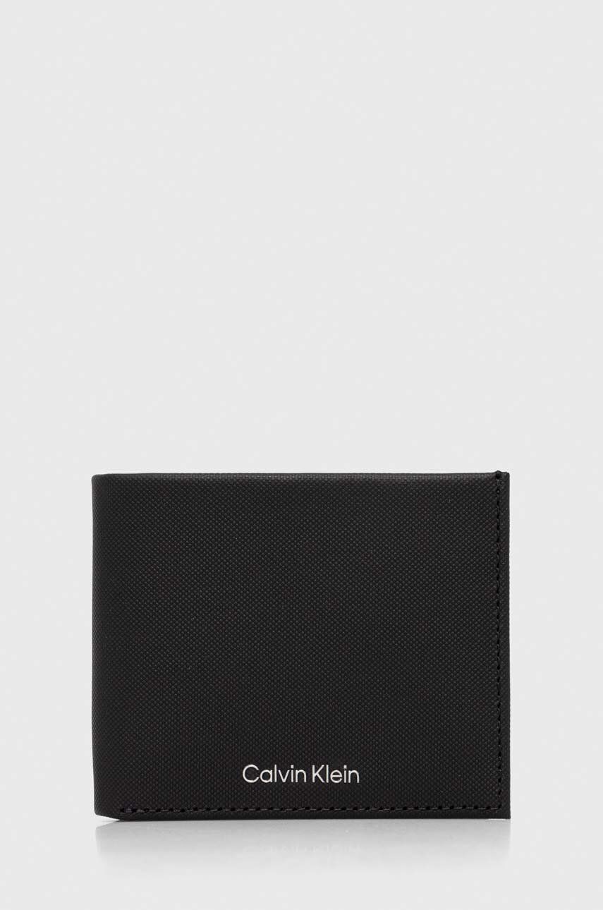 Levně Kožená peněženka Calvin Klein černá barva, K50K511383