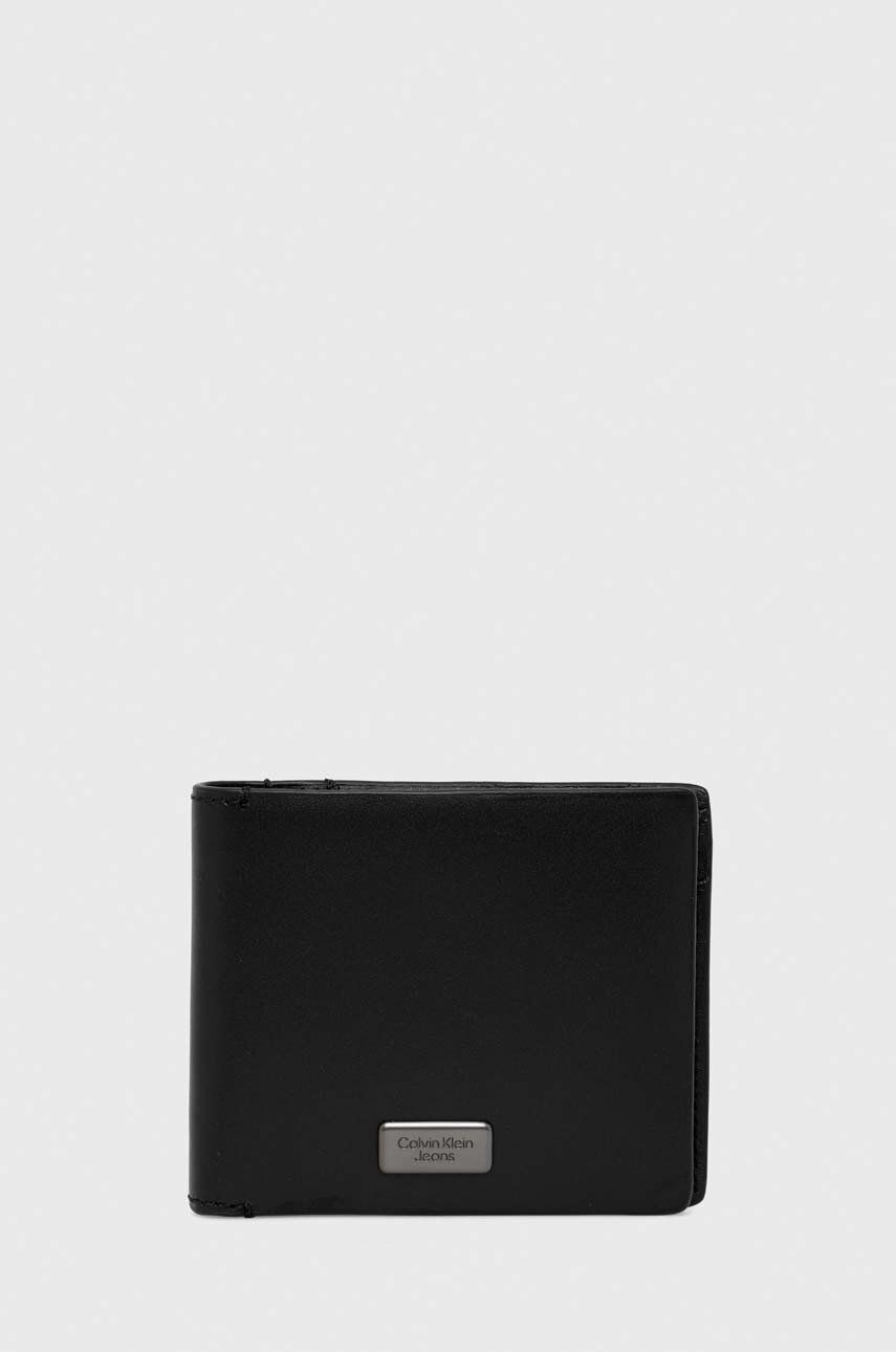 Levně Kožená peněženka Calvin Klein Jeans černá barva, K50K511432