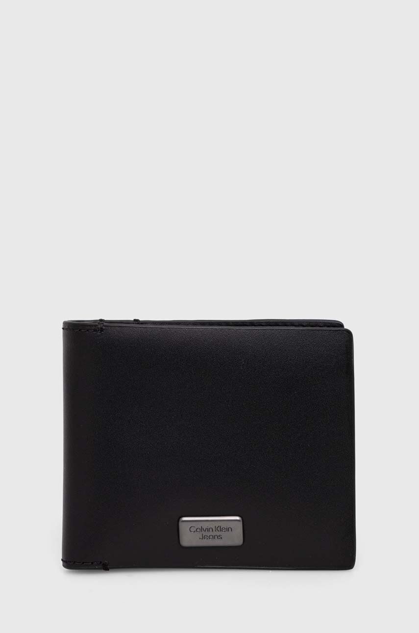 Levně Kožená peněženka Calvin Klein Jeans černá barva, K50K511451