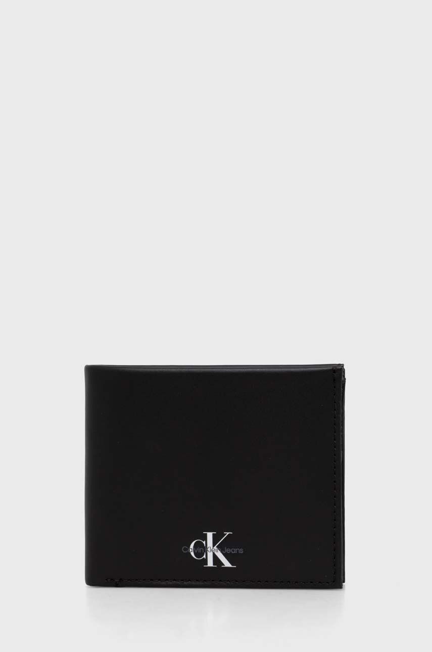 Levně Kožená peněženka Calvin Klein Jeans černá barva, K50K511456