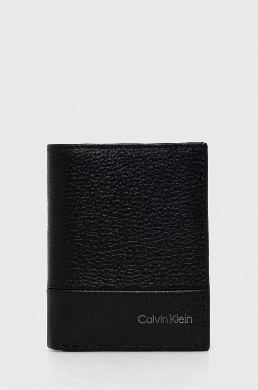 Levně Kožená peněženka Calvin Klein černá barva, K50K511667