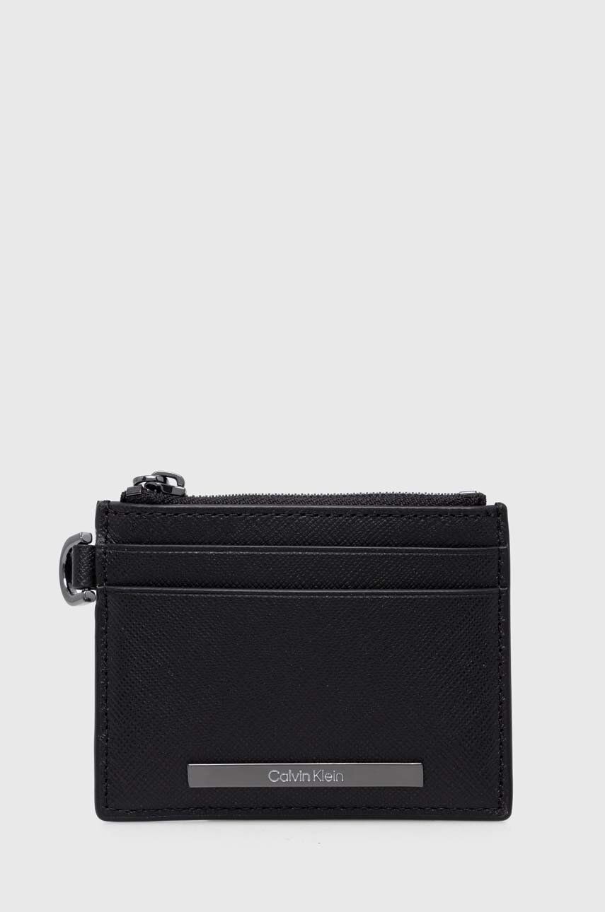 Levně Kožená peněženka Calvin Klein černá barva, K50K511670