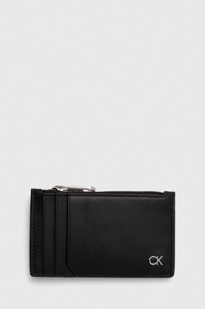 Levně Kožená peněženka Calvin Klein černá barva, K50K511685