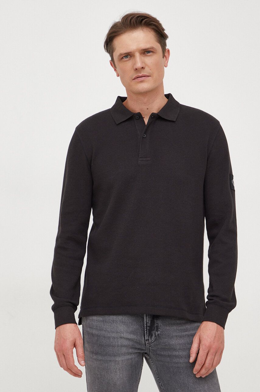 Levně Bavlněné tričko s dlouhým rukávem Calvin Klein Jeans černá barva, J30J324961