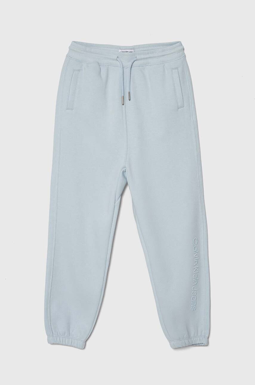 Levně Dětské tepláky Calvin Klein Jeans s aplikací