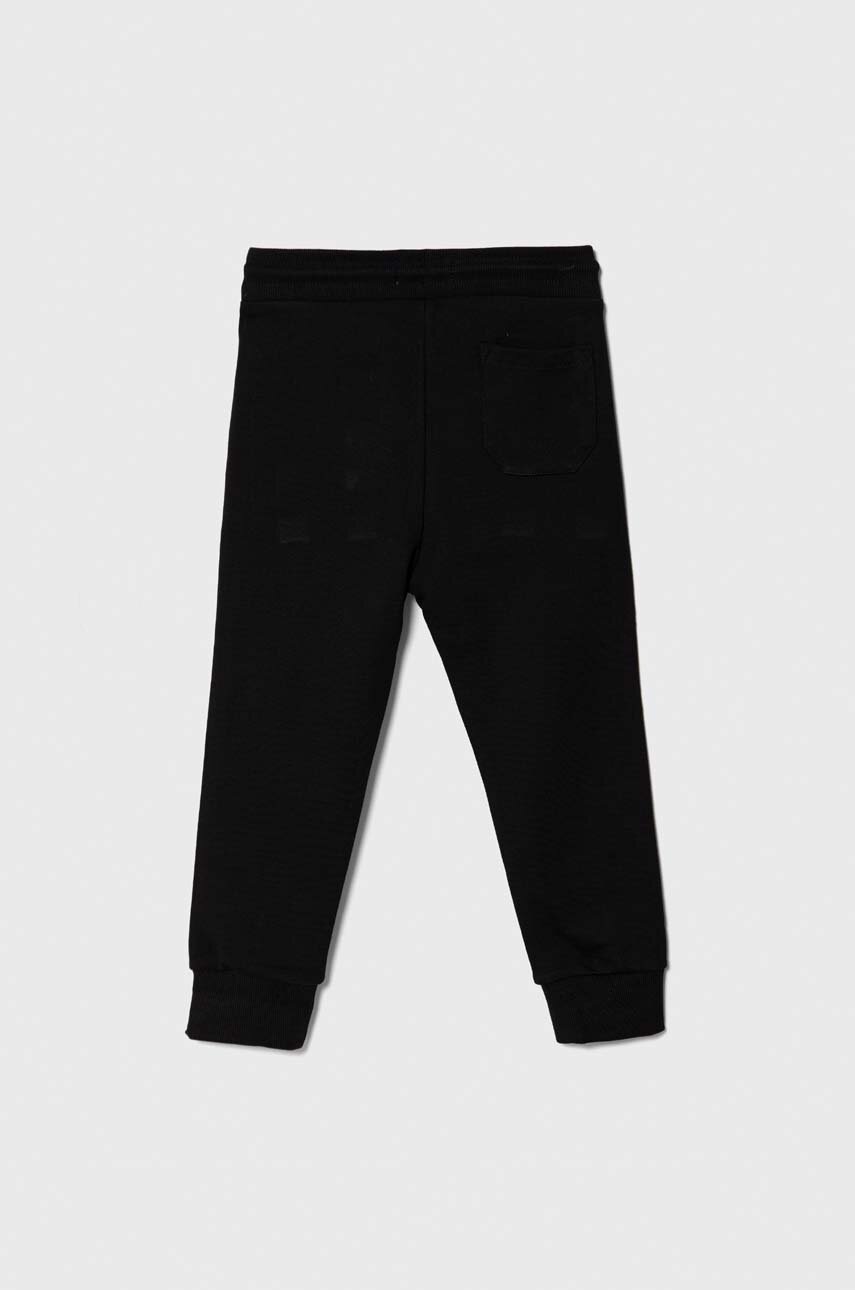 Дитячі бавовняні штани Calvin Klein Jeans колір чорний з принтом