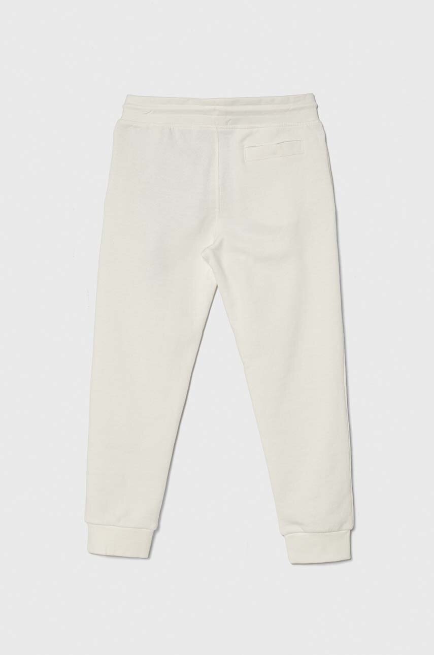Детские спортивные штаны Guess цвет белый однотонные