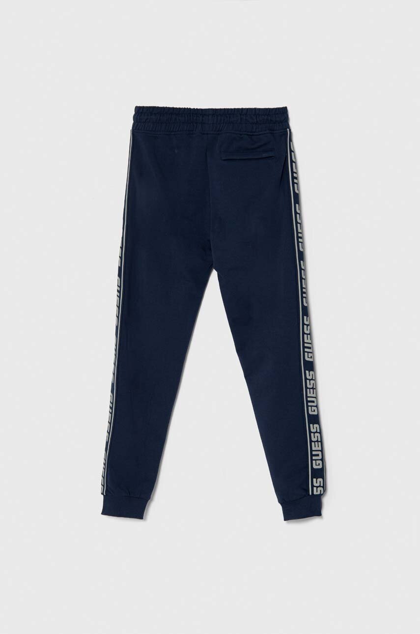 Детские спортивные штаны Guess цвет синий с принтом