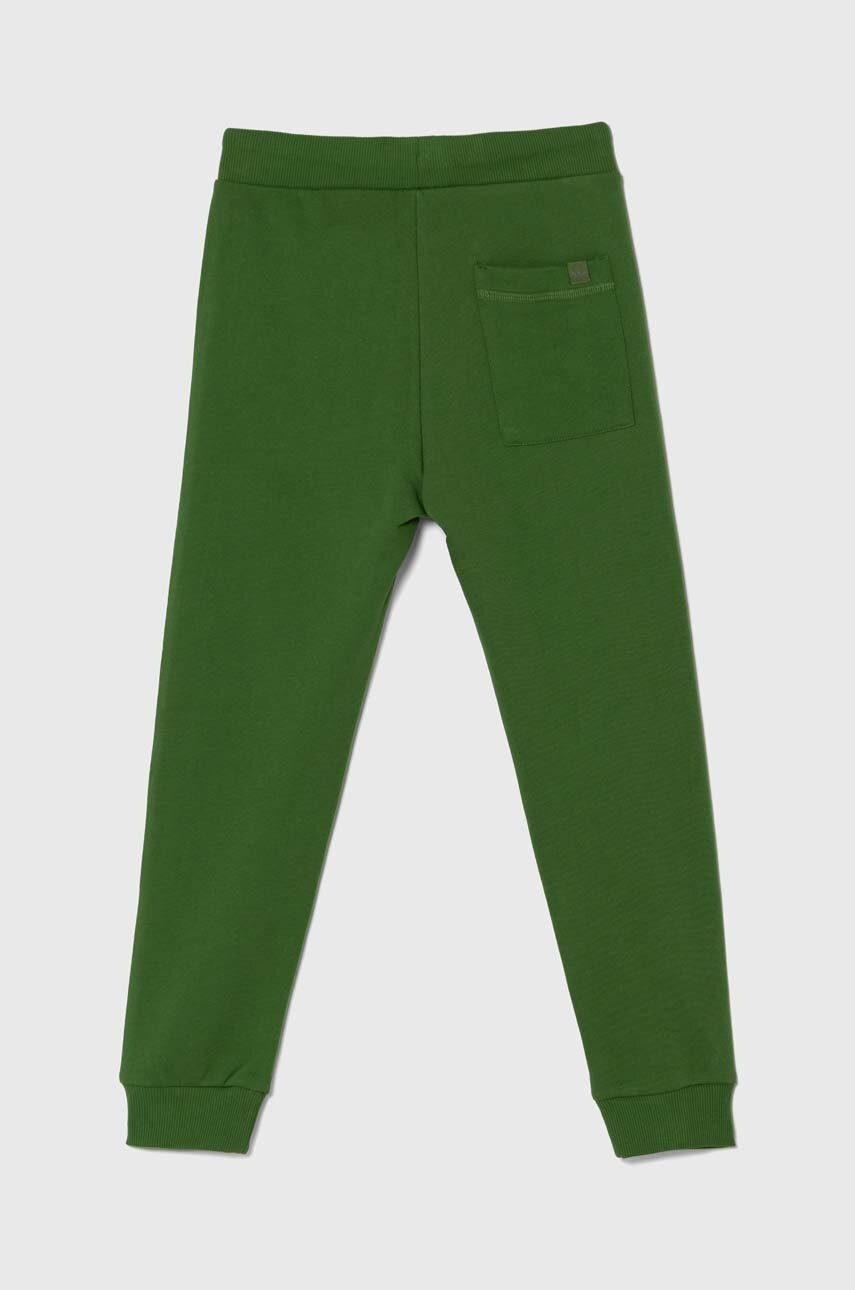 Дитячі бавовняні штани United Colors of Benetton колір зелений однотонні