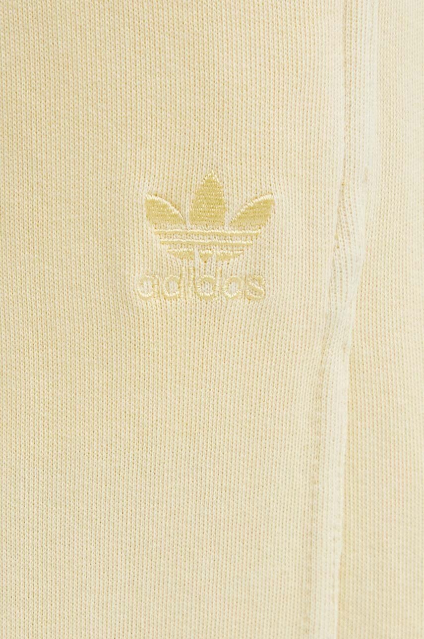 Бавовняні спортивні штани adidas Originals колір жовтий однотонні 