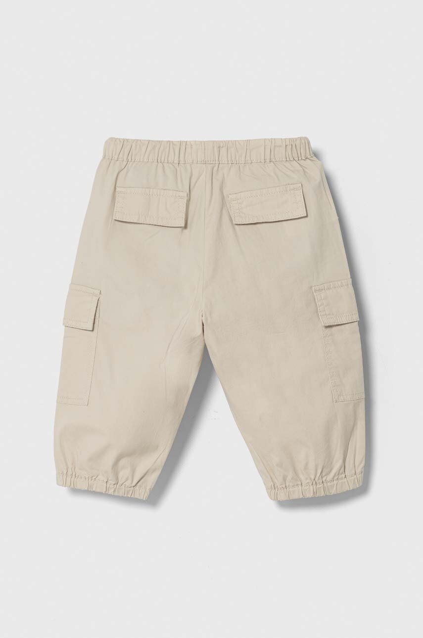 Дитячі штани United Colors of Benetton колір бежевий однотонні