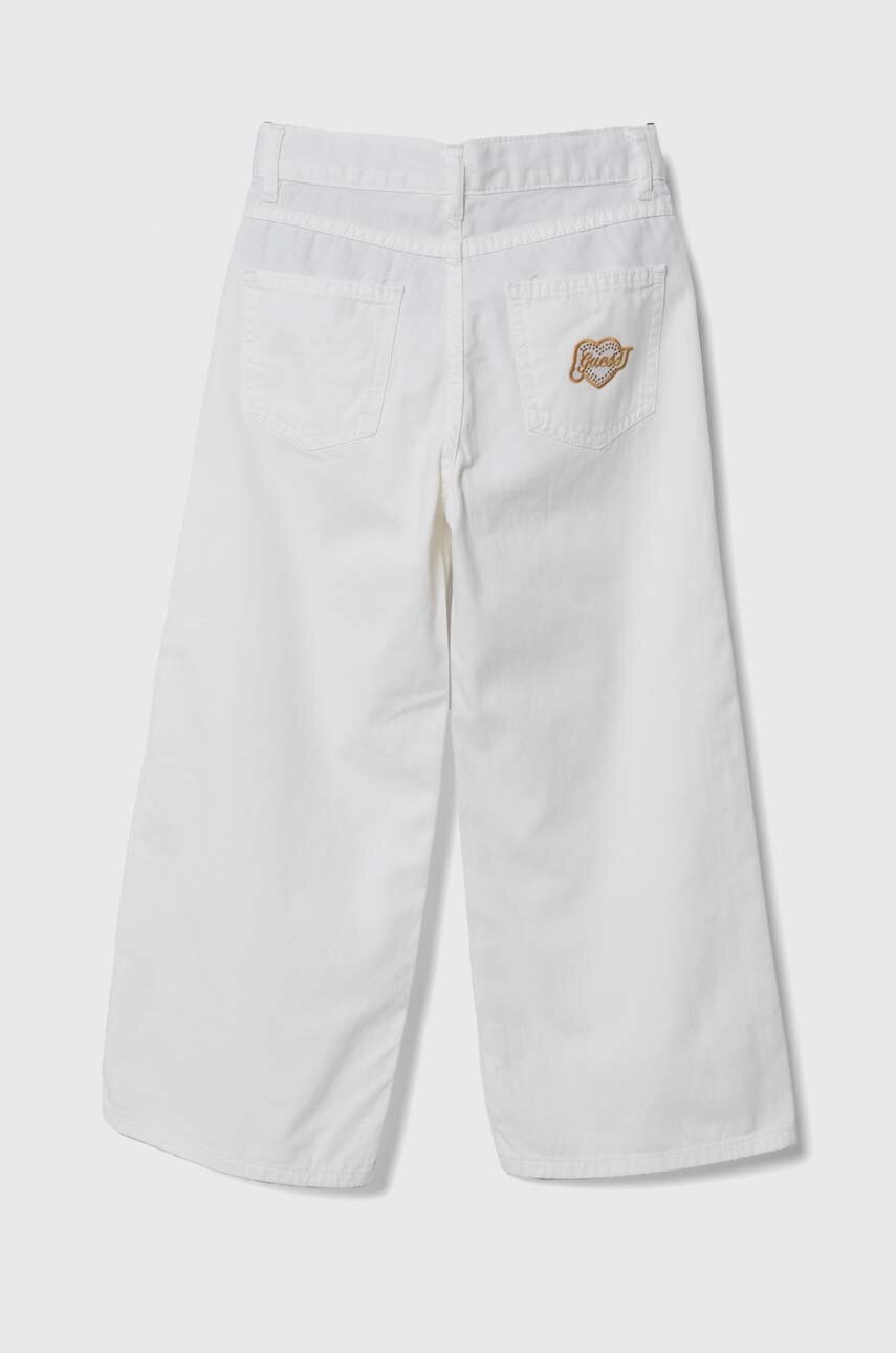 Дитячі бавовняні штани Guess колір білий однотонні